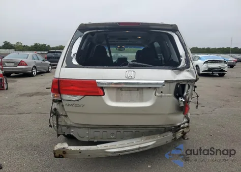 2009 Honda Odyssey Touring z USA, uszkodzony, nr VIN 5FNRL389X9B003277